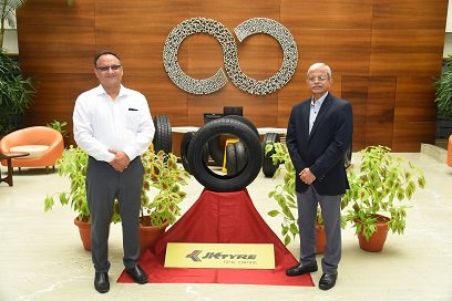 Right to Left-Dr R Mukhopadhyay,Director R&D and Mr. Vipin Basan,Head Product Development unveil the new EV tyres