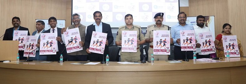 Avinash Mohanty, D. Joel Davis seen unveiling the poster of the Grace Cancer Run 2024. Also seen are Dr Chinnababu Sunkavalli, Ramesh Kaza, Prashant Nandella and others